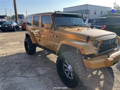 2014 Jeep Wrangler Unlimited Sahara - Photo 5 - Monroe, LA 71201