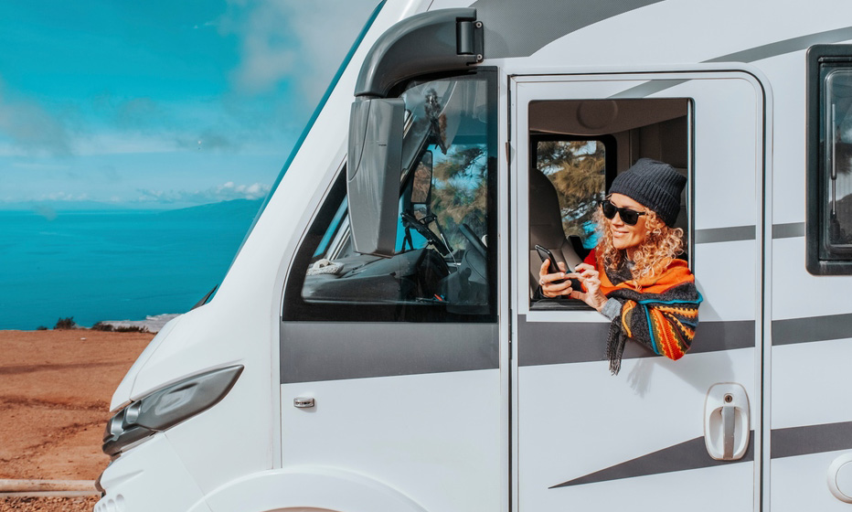 Woman making a call in her RV